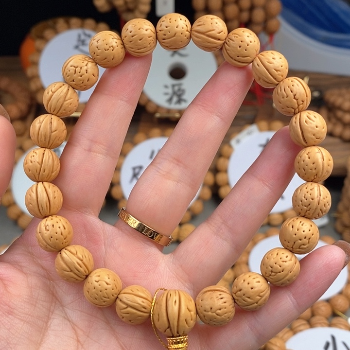 桃核手串金蝉子11.5a抛光板误差0.5