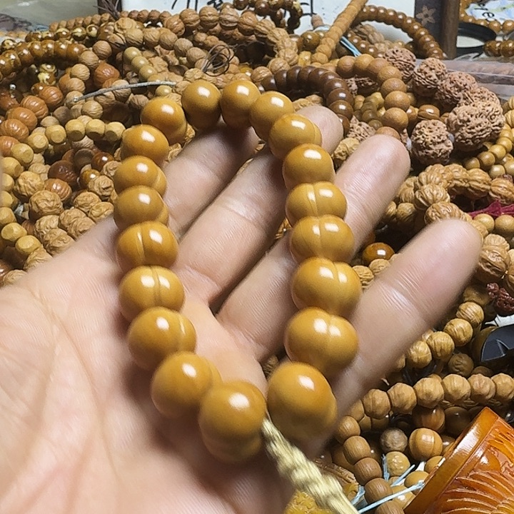 李***c猴头核桃手串屁桃