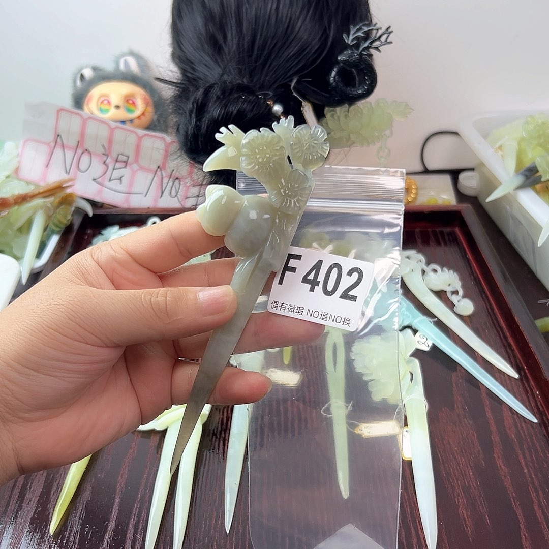 合金蛇纹石玉发饰窈****?