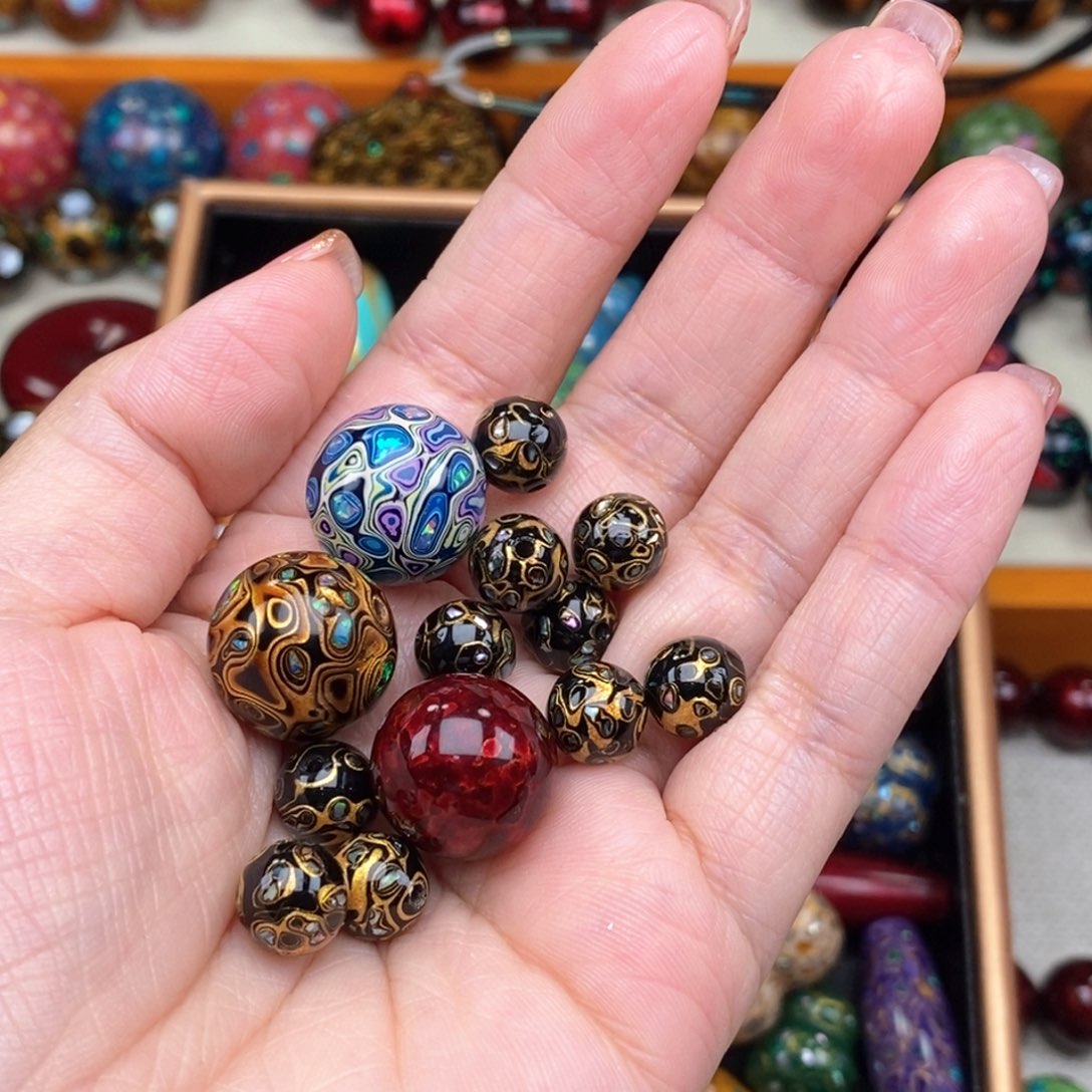 秀****光大漆珠。            