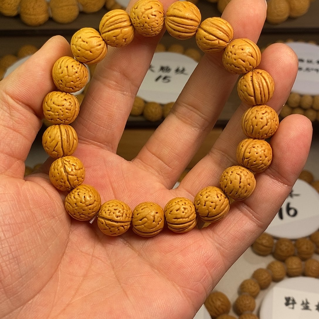 摇***去核桃精品桃核手串金丹