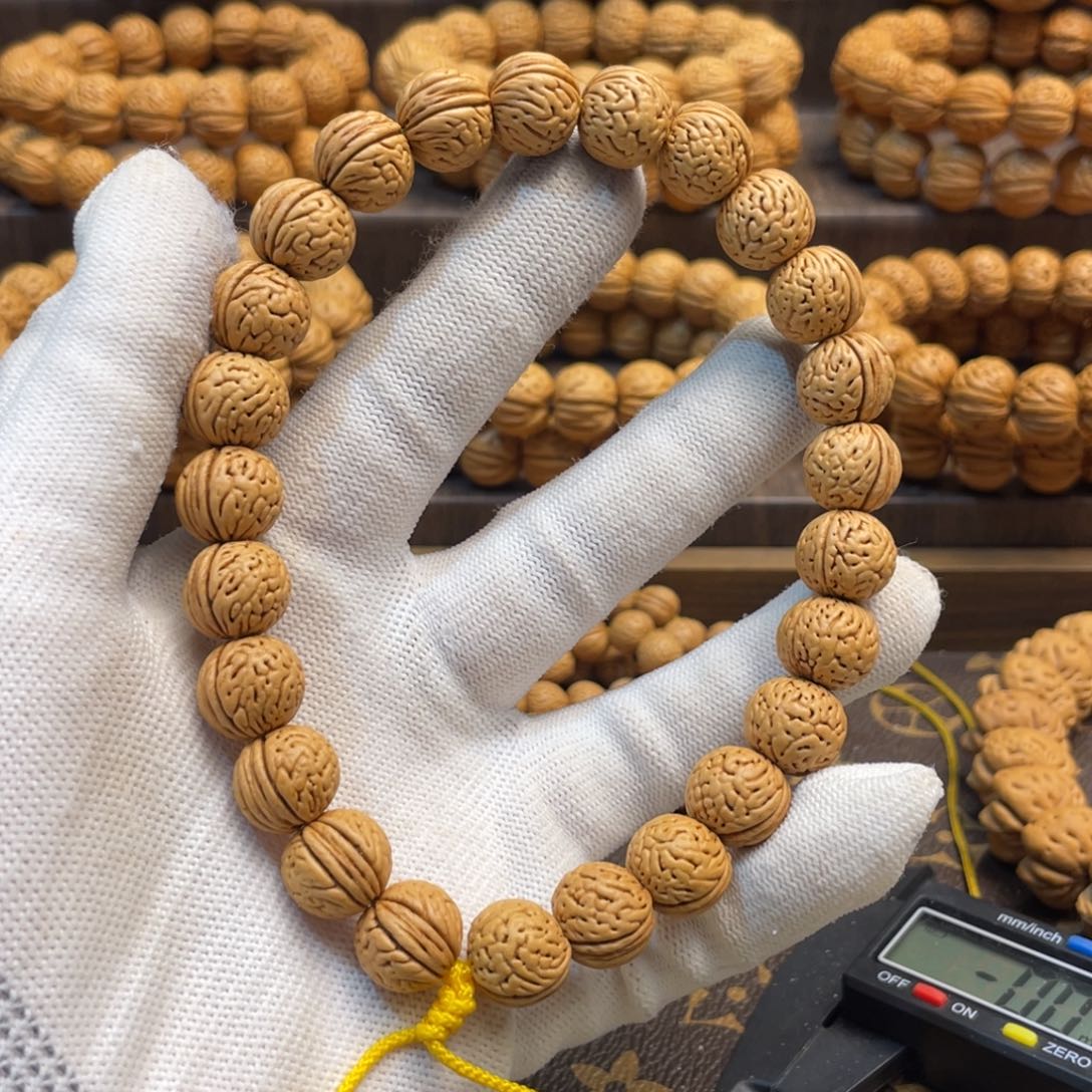 手串桃核野生玉麒麟