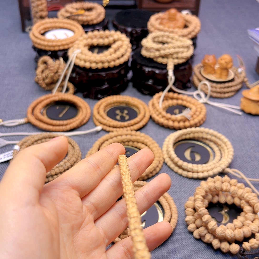 亲***孩柏香籽/百香籽手串