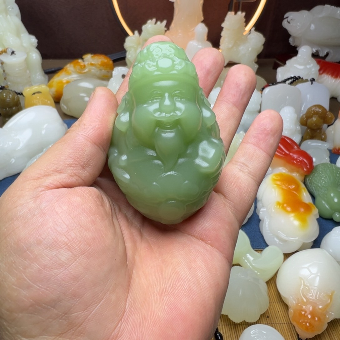 石材手工雕刻财神手把