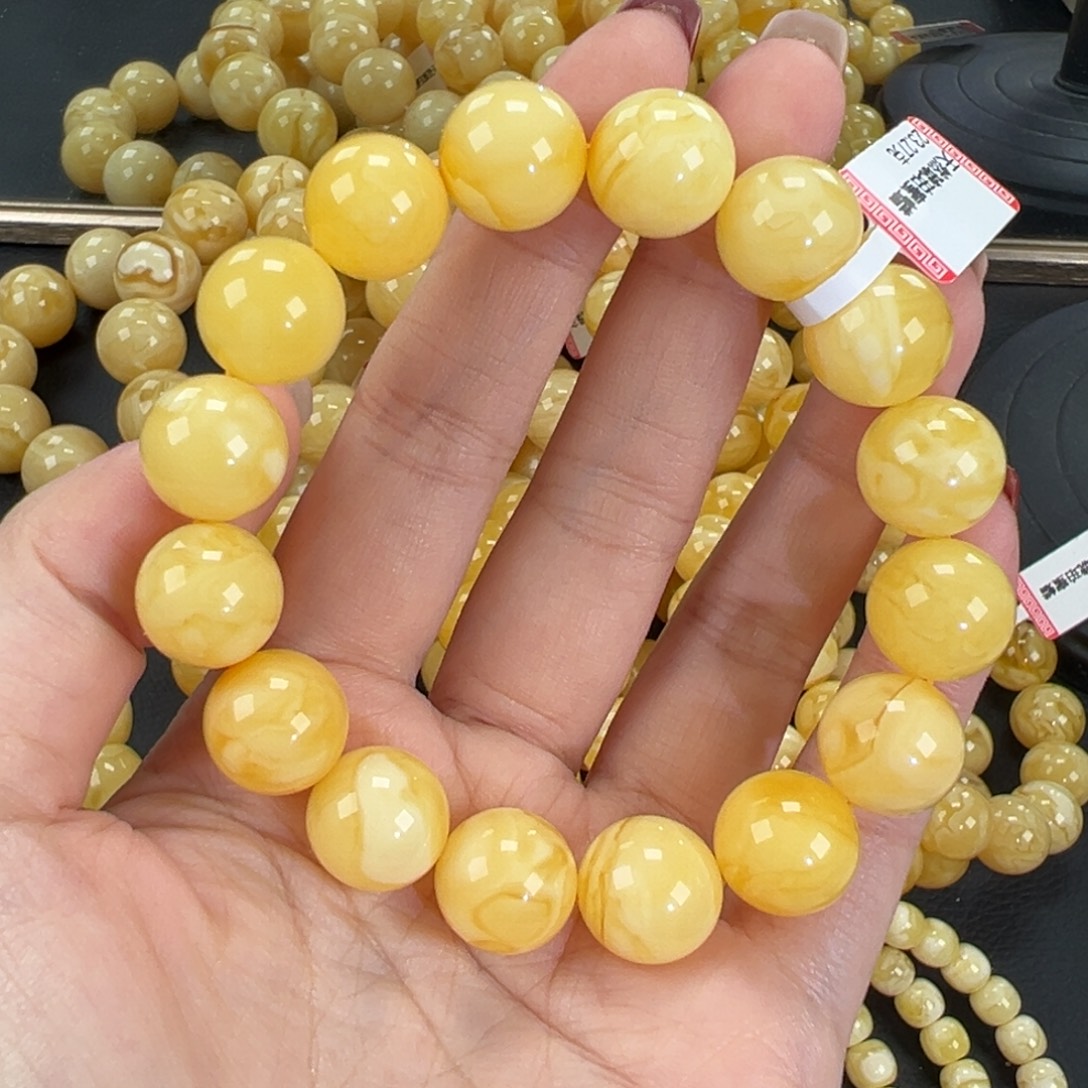 琥珀未镶嵌手链23.2黄白妖花
