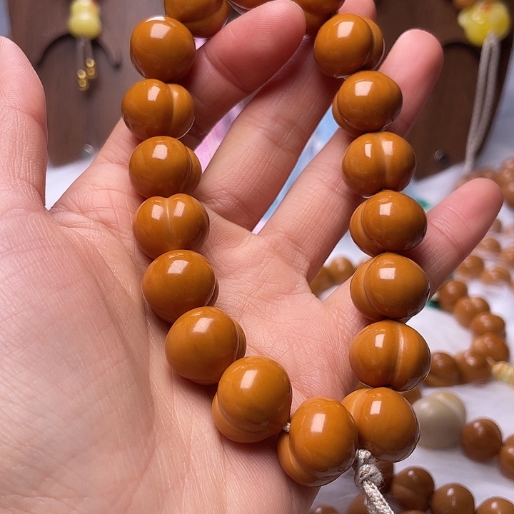 邳***练猴头核桃吊坠16尺寸柯基屁桃