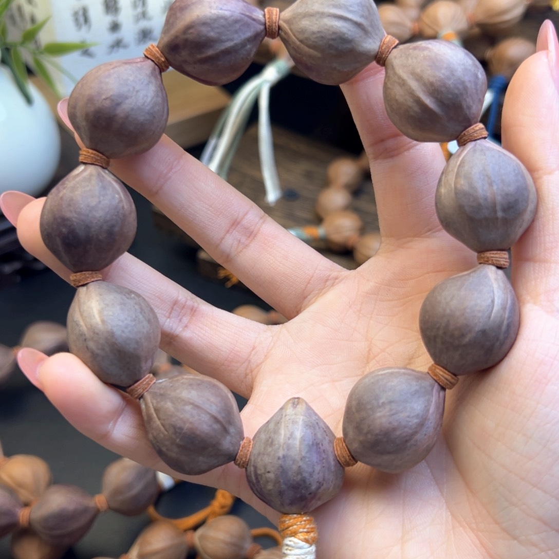 手串橄榄核001 215×25紫皮