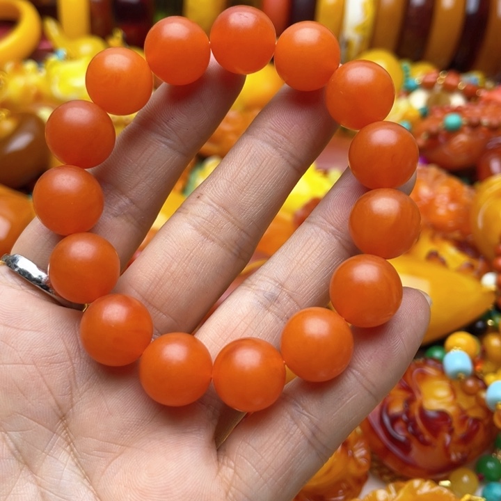 树脂制品75号橘色手串