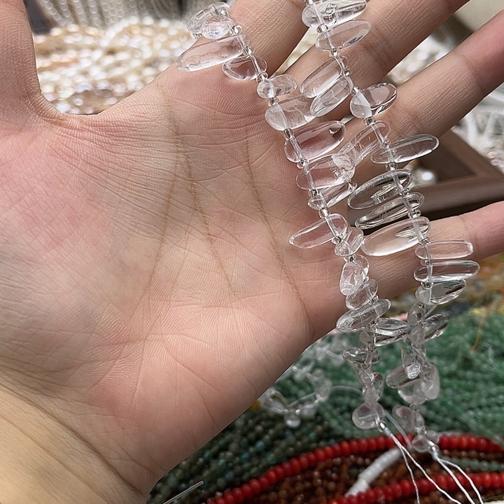 玛瑙/玉髓未镶嵌珠宝半成品一条白水晶侧孔长牙