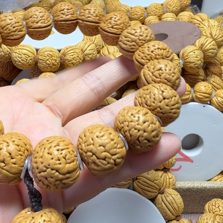 手串桃核宽旗磨盘