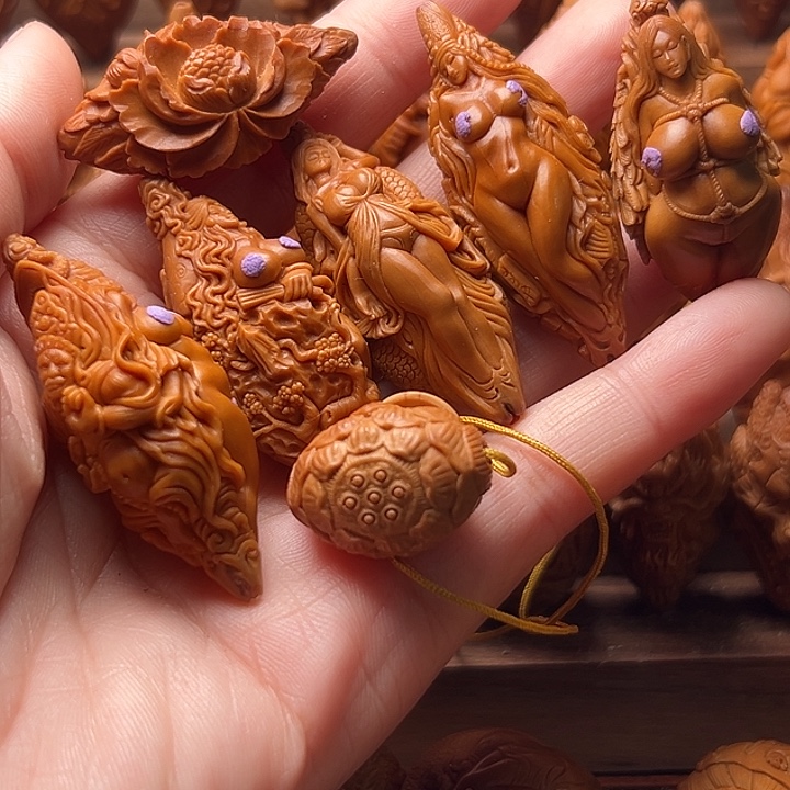 黑***迹橄榄核吊坠橄榄核