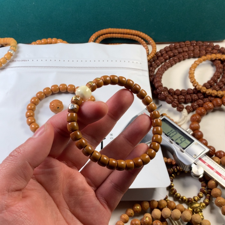 【闪购商品】橄榄核吊坠242558585555556868