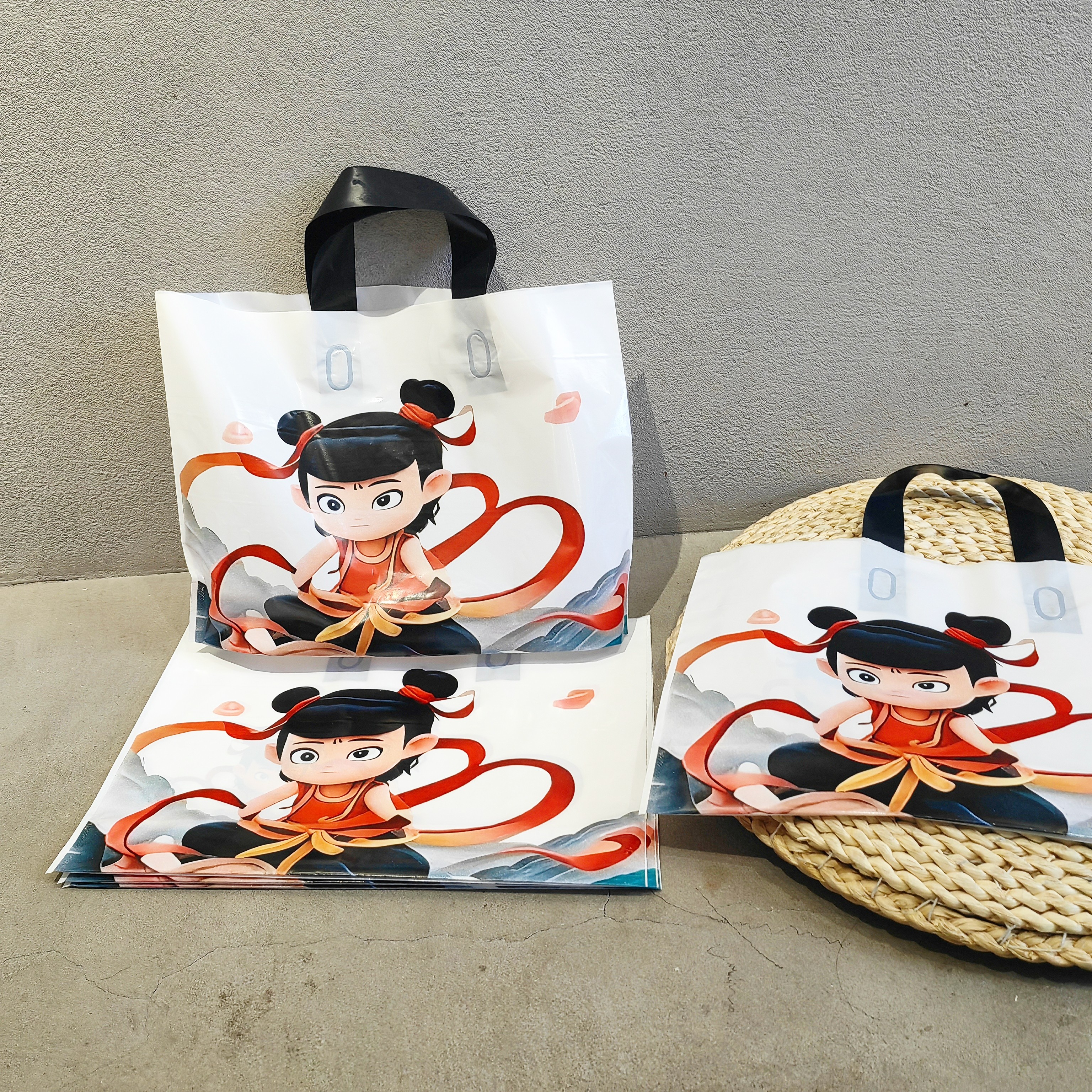 【超火】哪吒袋子那吒童装印花塑料手提袋定制logo加厚包装袋服装店