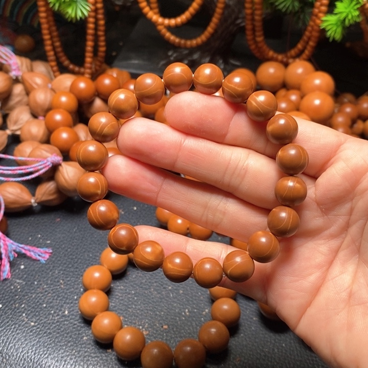 橄榄核手串1.1红料光珠