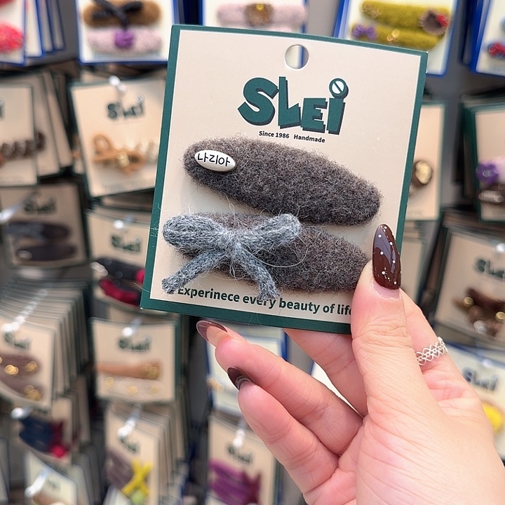 椭圆灰色蝴蝶结掰掰