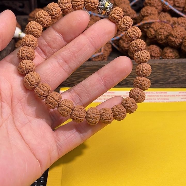 峰***…金刚菩提手串梅花