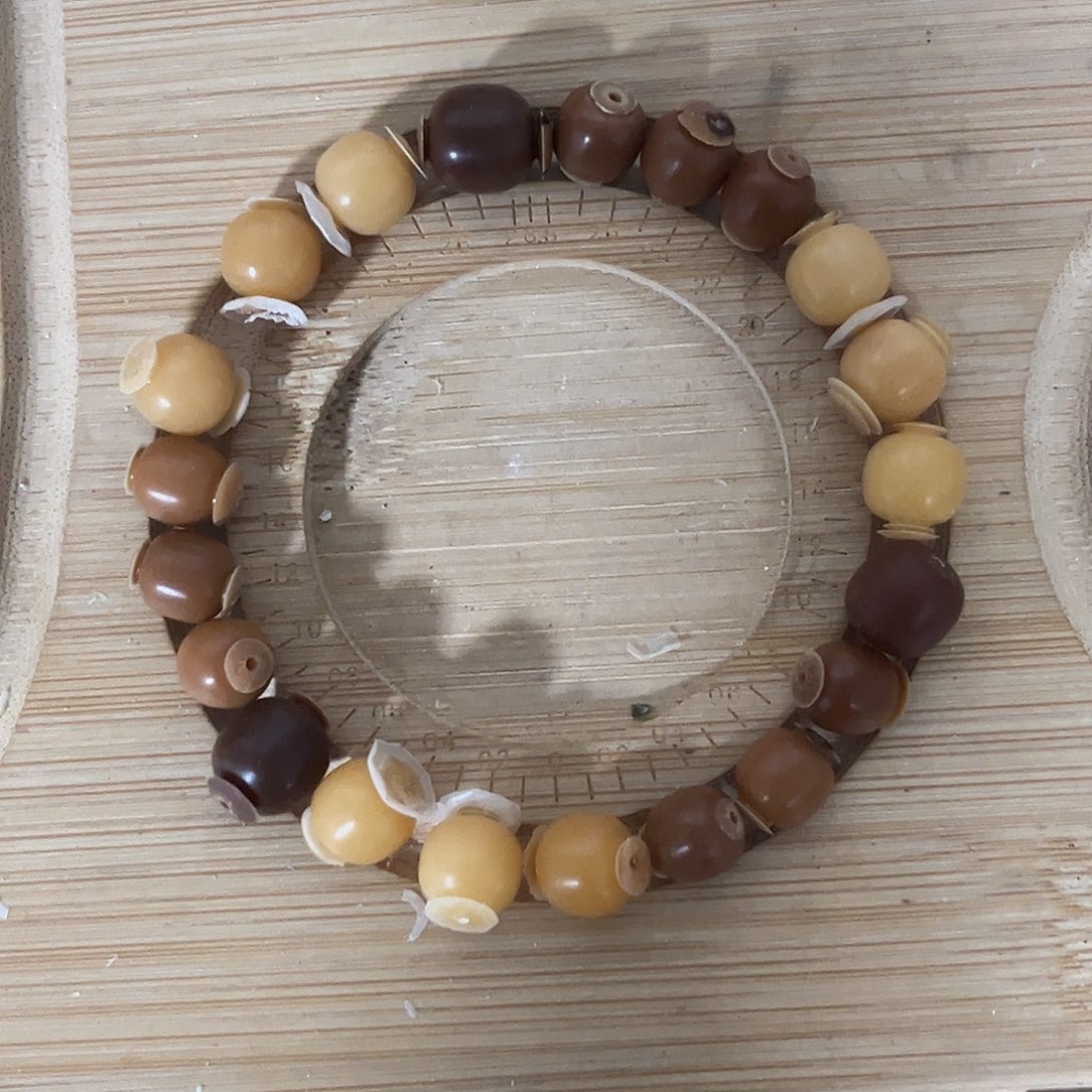 ****明菩提根/象牙果手串宗浅棕色鸡油黄