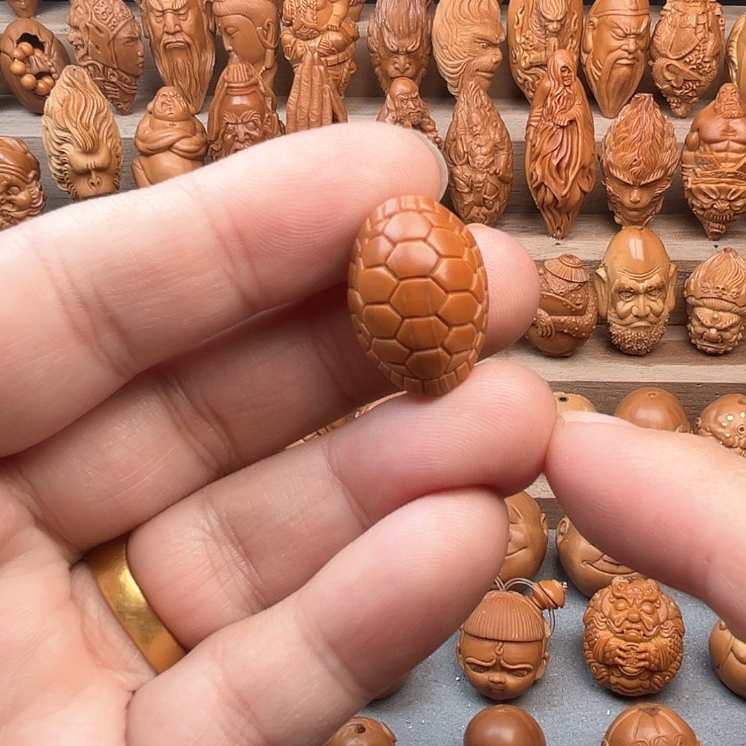 橄榄核吊坠17富甲天下