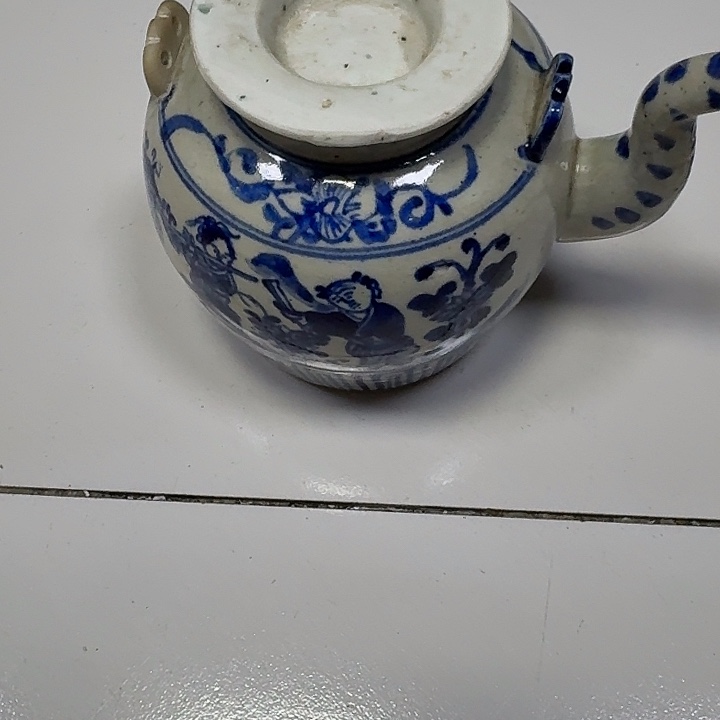 武***人青花壶有修品相如图
