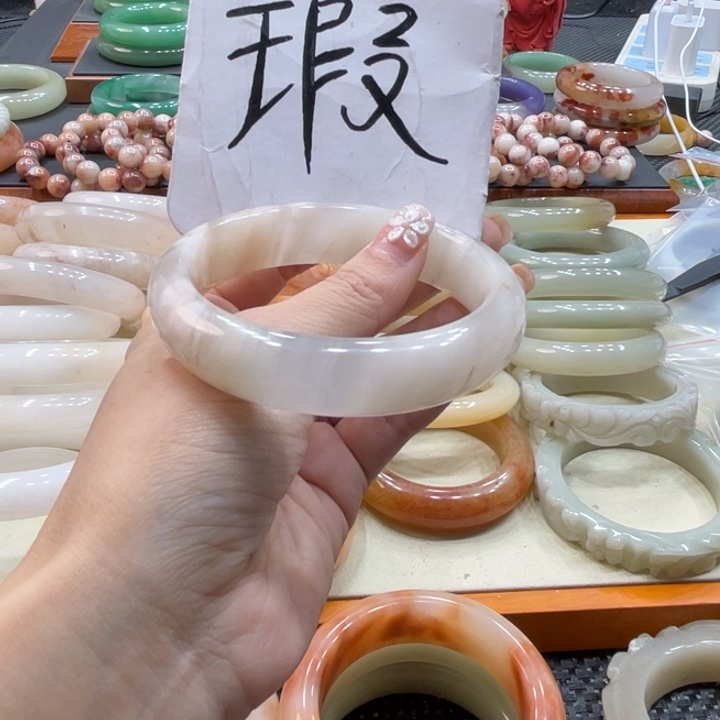 吱***赵石英质玉钛钢珠宝奇石60