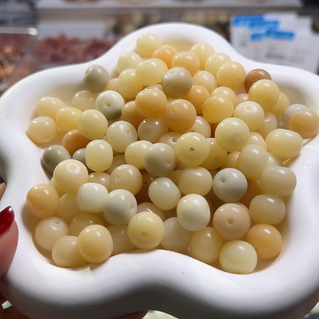 菩提根/象牙果吊坠130颗卡12肉色平果有黑点