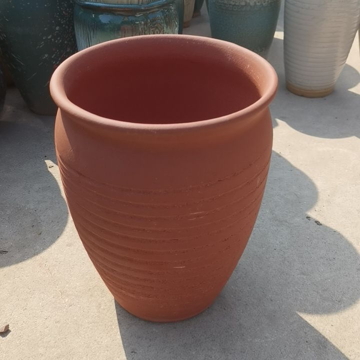 红陶口20高27瑕疵底部烧裂