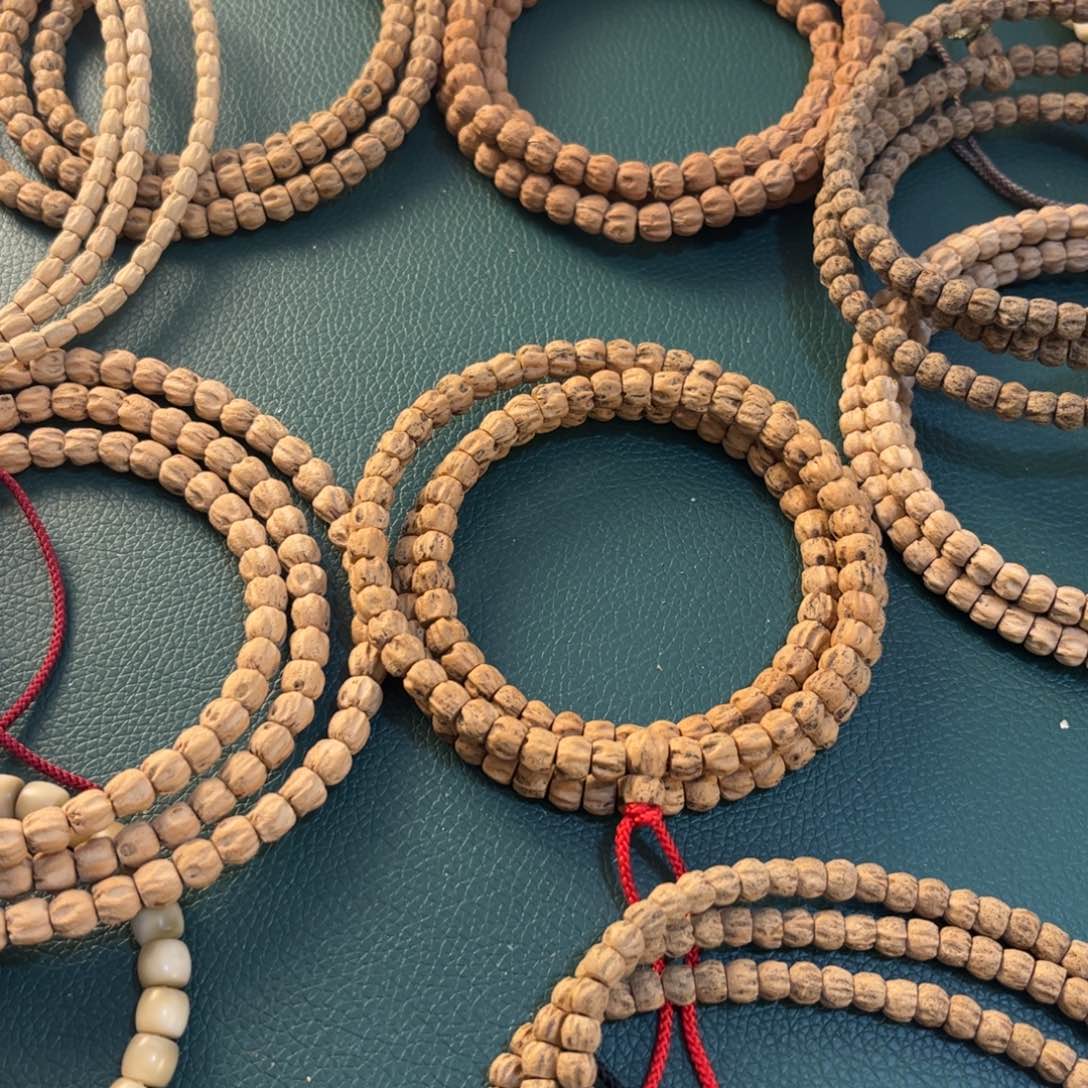 菩提根/象牙果吊坠张**?