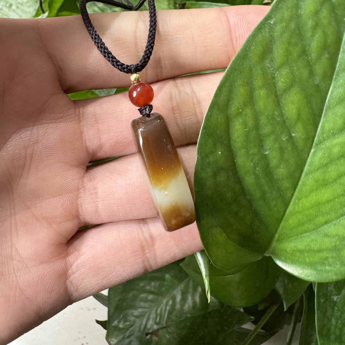 新疆和田玉天地糖男女同款吊坠。