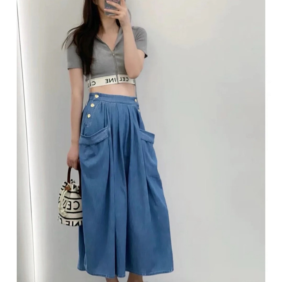 99新 Celine/思琳 D500970/马车扣子牛仔半裙/26码