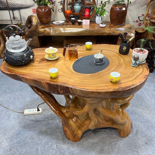 香樟木一体成型镂空仿树根茶台