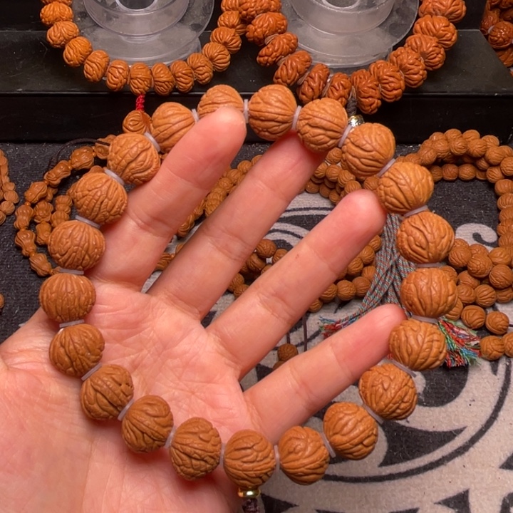 桃核手串龙纹甲骨14手持