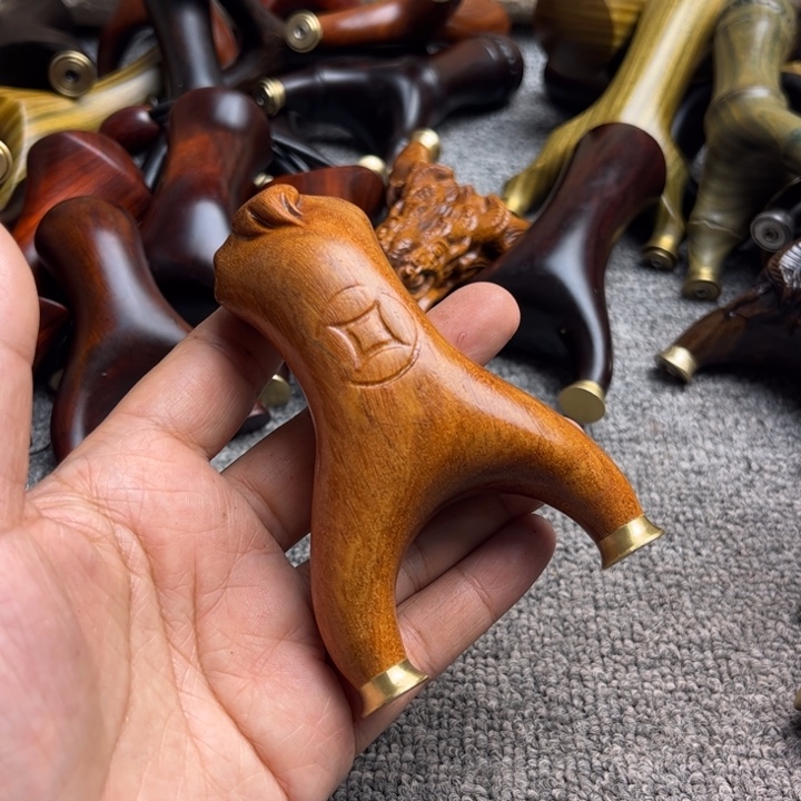 木瑕疵金星紫檀铜头雕刻