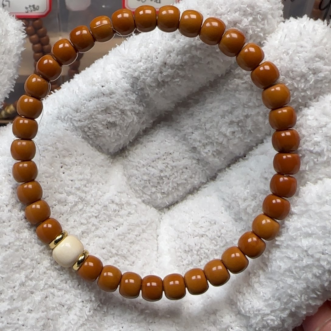 橄榄核手串老挝6.6mm全无白单圈