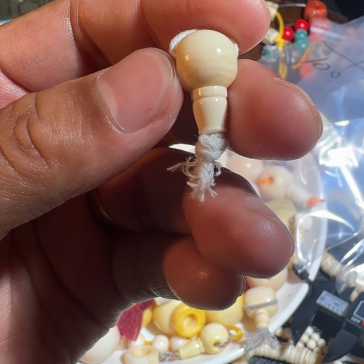 一***黑吊坠菩提根/象牙果