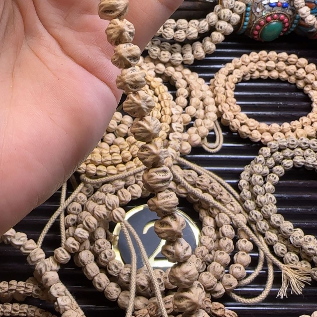 柏香籽/百香籽吊坠嶅**院