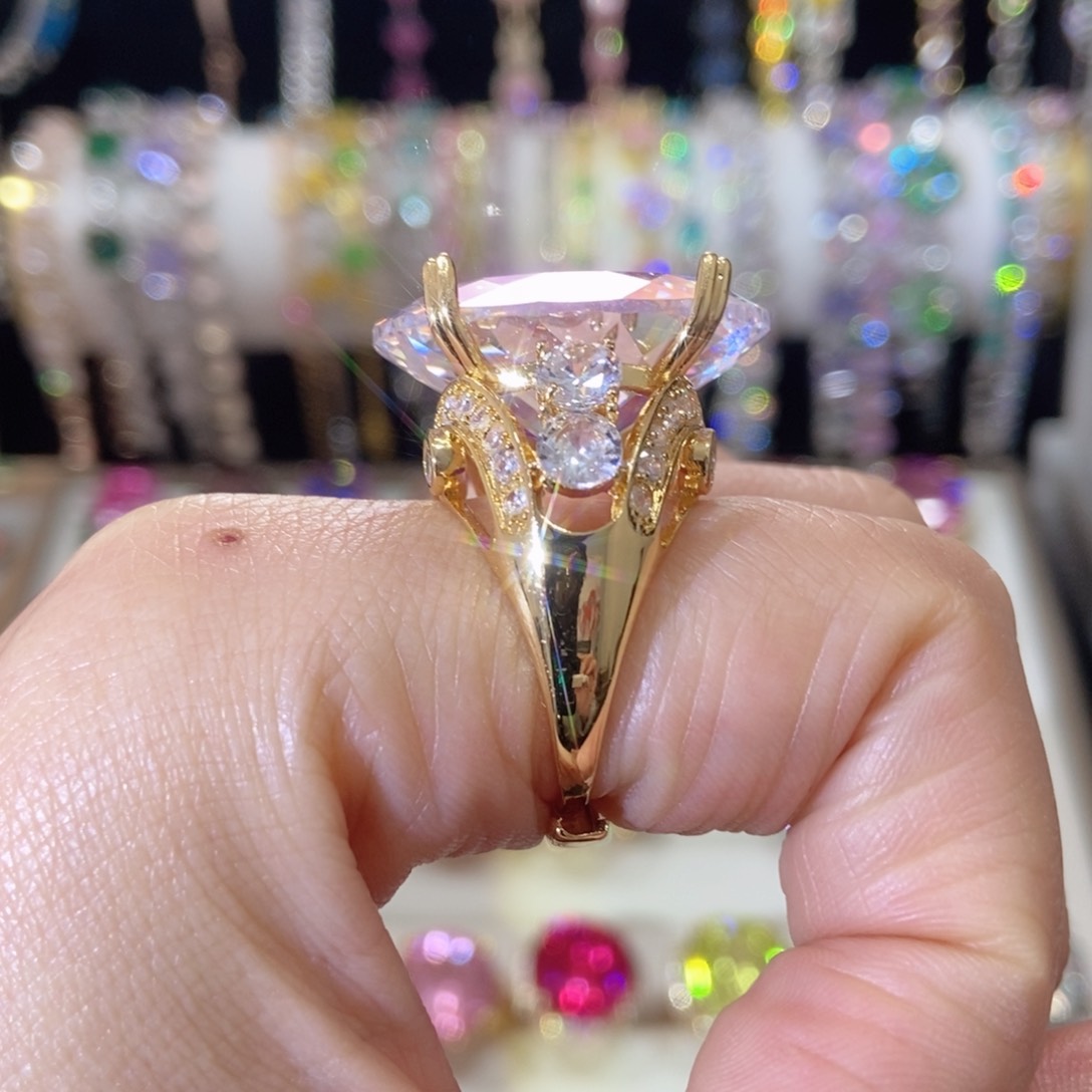 66锆石（处理）炫彩水滴戒指