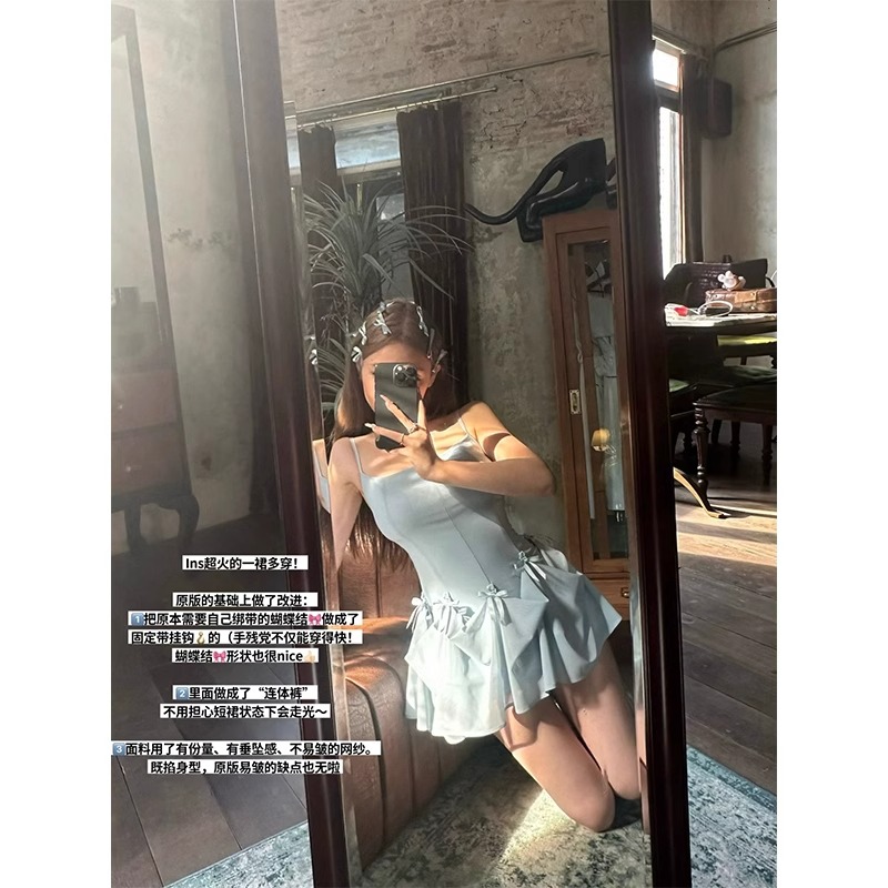 （运补6-8）甜妮收腰显瘦中长吊带连衣裙女短裙修身重蝴蝶结短裙