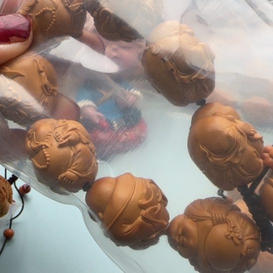 橄榄核手串冰****）雕刻工艺