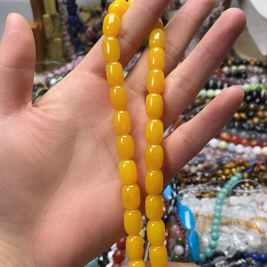 玛瑙/玉髓未镶嵌珠宝半成品10×14黄玛枣珠一条