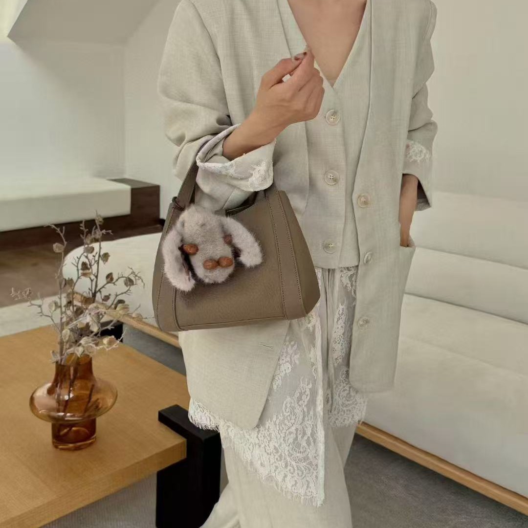 磁扣锁扣单根水桶包可折叠斜挎包手机包小包包手拎包