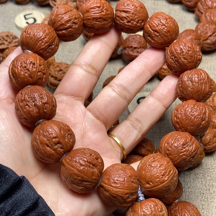 文玩核桃吊坠红皮柿子