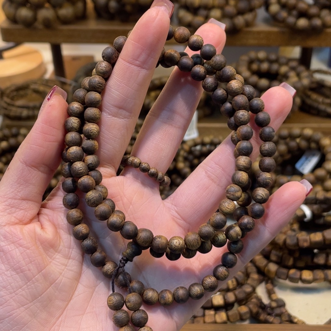 悉***多沉香卡6多圈沉水浮圆珠一条