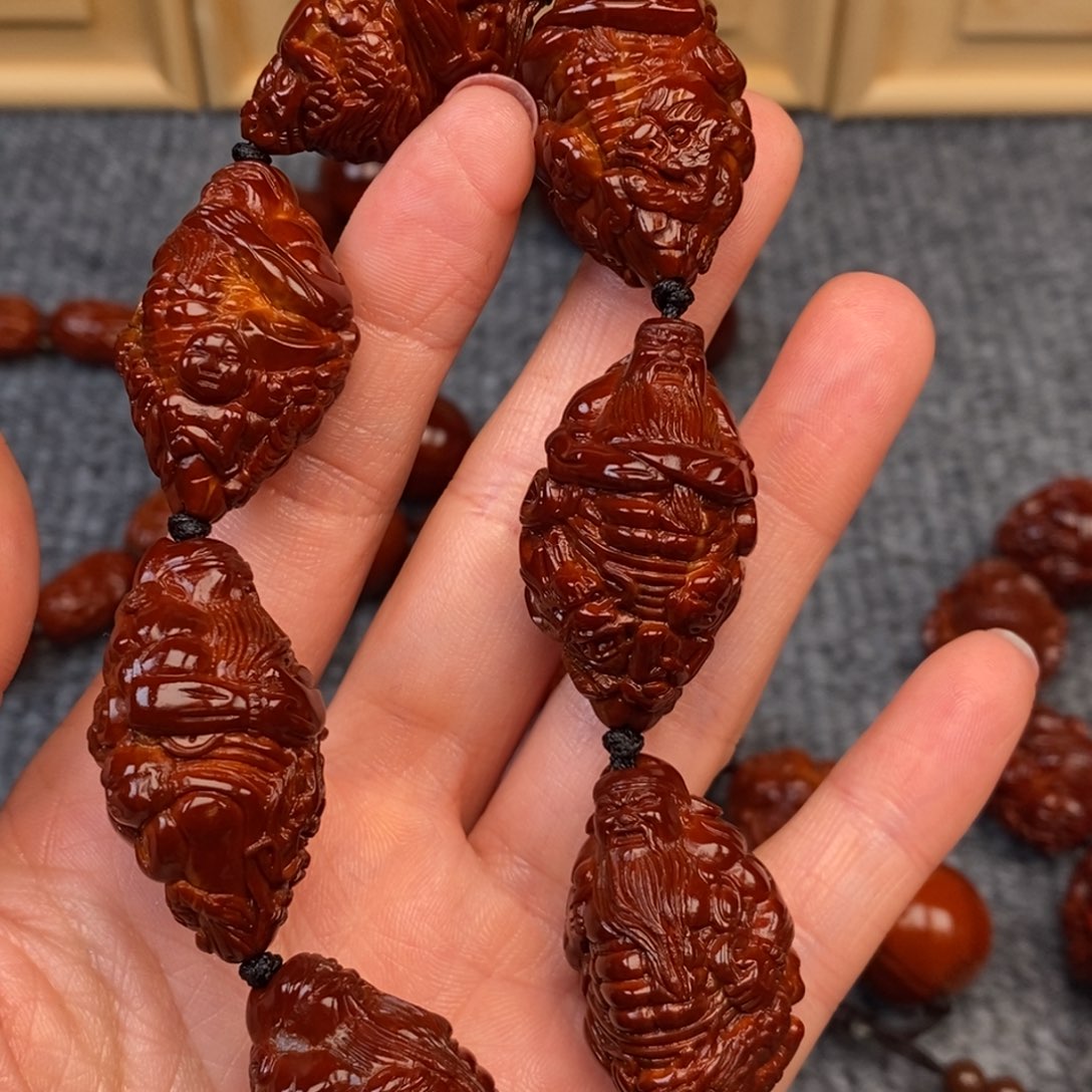 知***报手串/手链橄榄核瑞兽关公