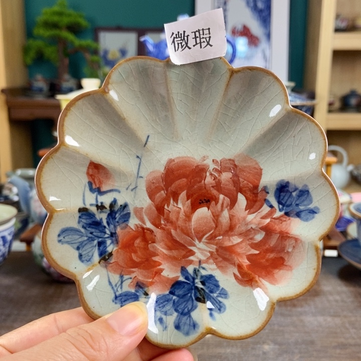 瓷片手工制作工艺精湛等特点为