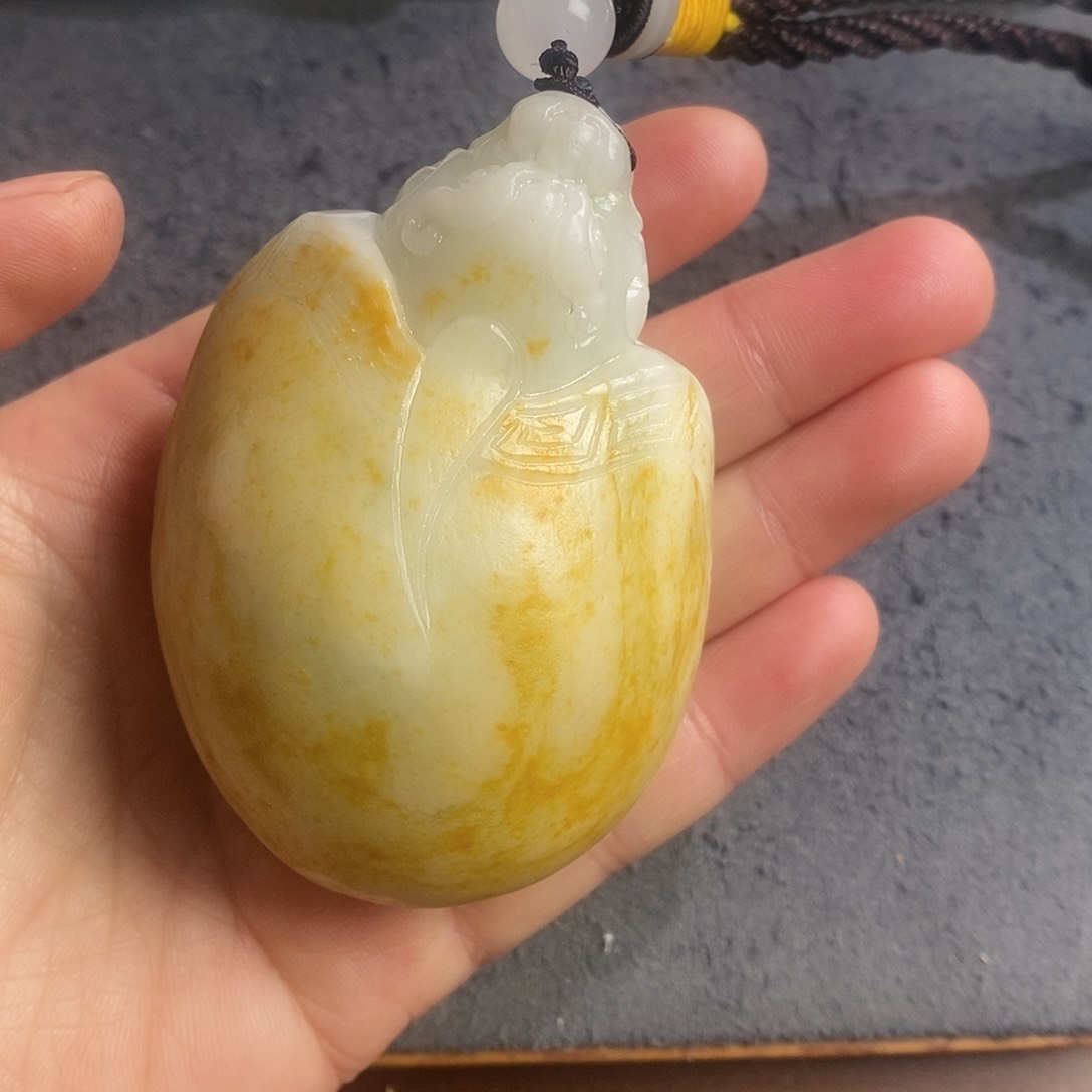 有机玻璃和田玉手把件……