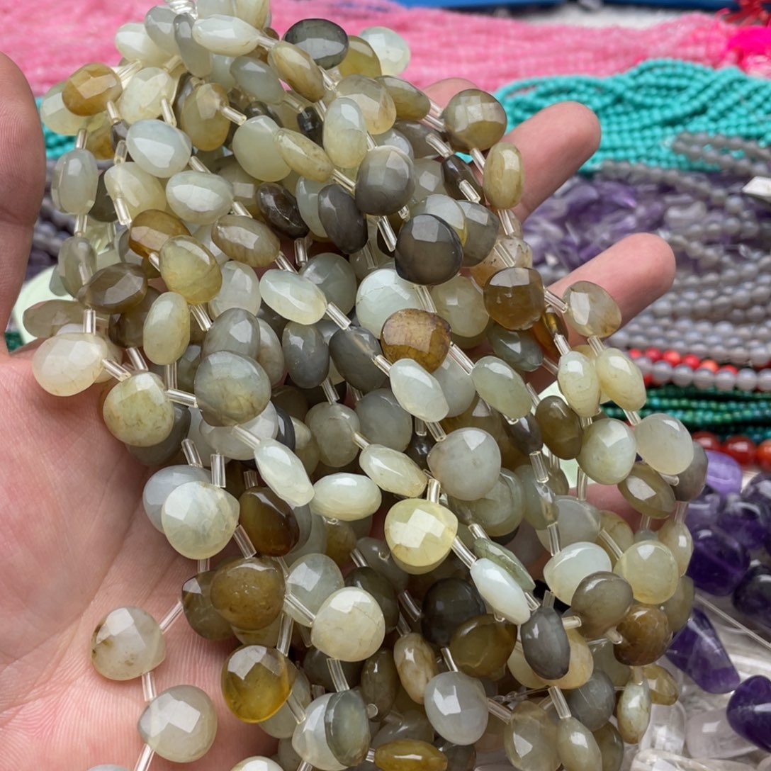 玛瑙/玉髓珠宝半成品未镶嵌两个半条且末微糖切面二八孔雨滴