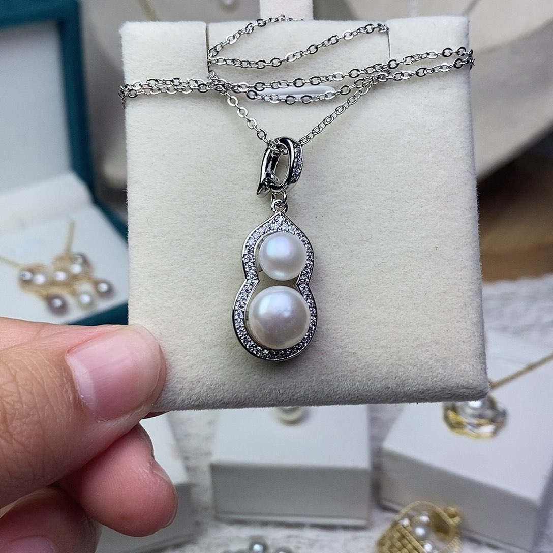 淡水珍珠银S925镶嵌耳饰