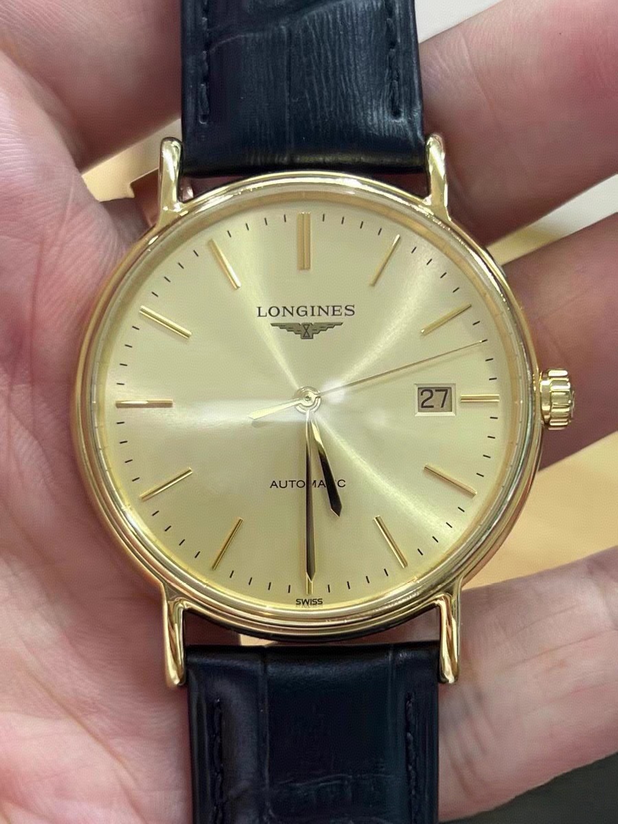 99新 Longines/浪琴 单表/瑰丽男表/38.5表径/背透888机芯/金色盘