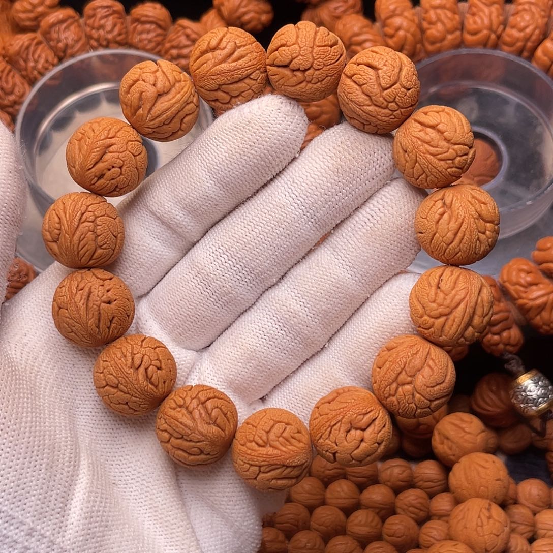 桃核手串金丝龙珠1.6