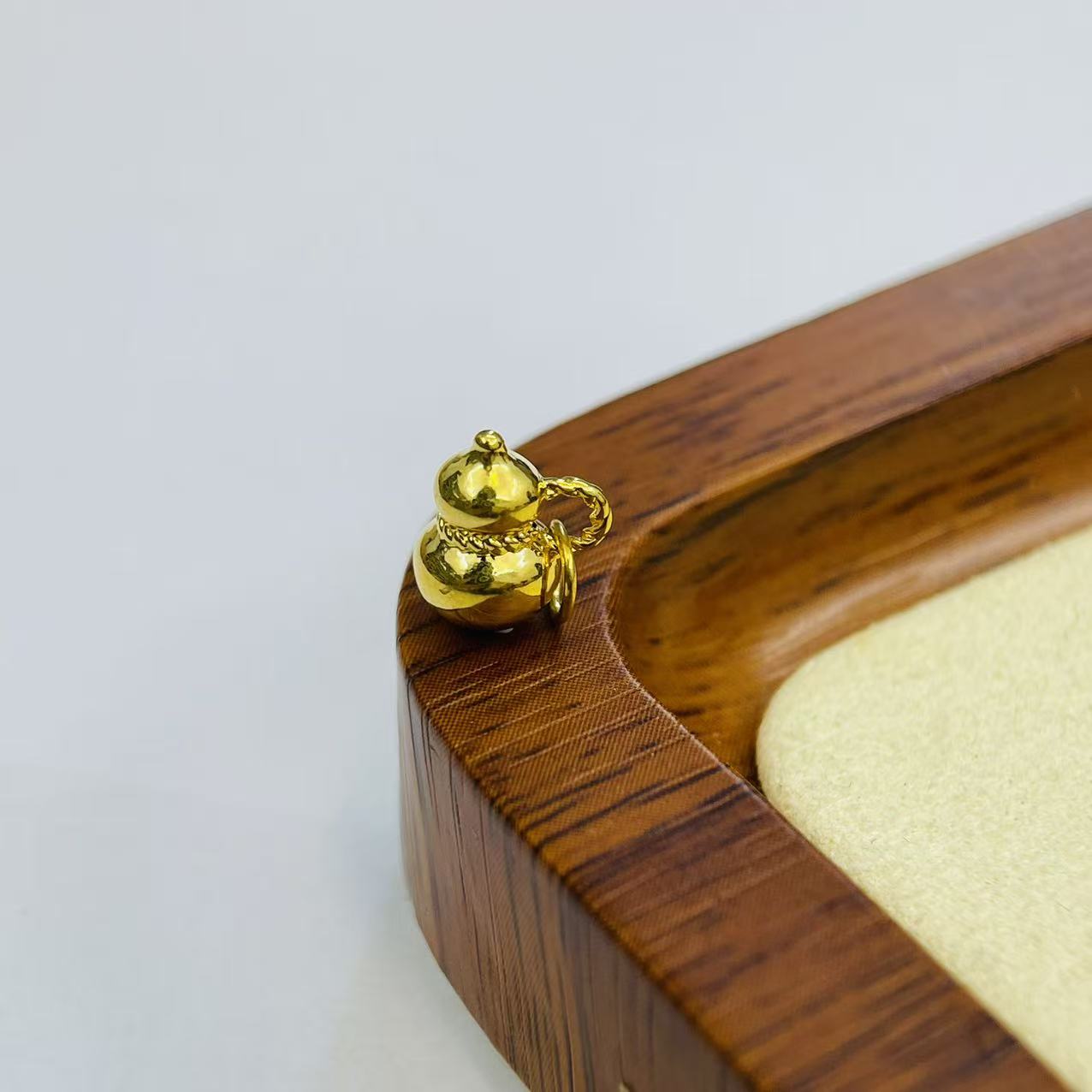 新金社黄金足金999光面小葫芦提溜DP1893-0170